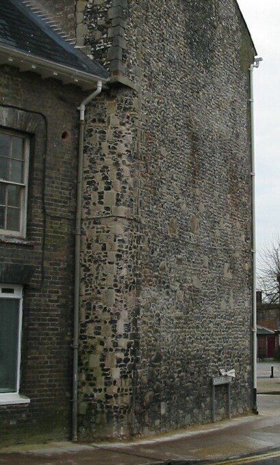 Stone on corner of Castle Street, Thetford - robbed from the Priory