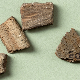 some manure scattered potsherds