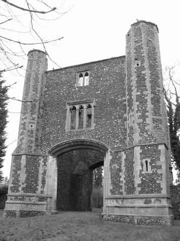 The flint and stone architecture of the medieval Cluniac Priory Gatehouse in Thetford, Norfolk