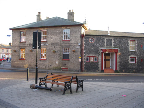 Thetford town centre near the Red Lion pub, showing boarded up windows and doors following social unrest